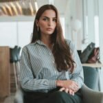 Portrait of Sitting Brown Haired Businesswoman