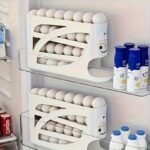 Soporte para huevos con ruedas de 4 niveles, diseño lateral que ahorra espacio, capacidad para 30 huevos, acabado brillante suave, asa práctica, adecuado para almacenamiento en cocina o frigorífico, accesorio de cocina moderno, plástico duradero - Image 2