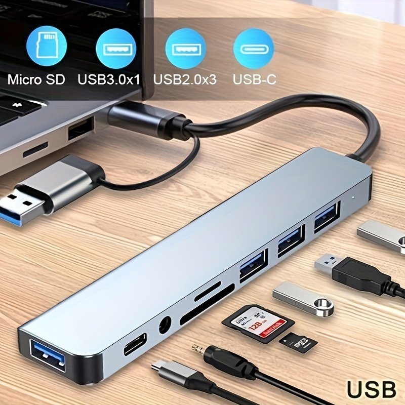 3de155cc-e1a6-4e5f-9e69-9fe62ad372b4.jpg Hub USB C 1 8 en 1 con conector de audio | Compatible con tablets, alimentado por USB, voltaje de funcionamiento de 5V - Image 1