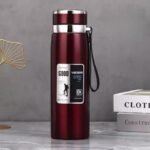 Gran capacidad / 35.50 oz, aislamiento de doble capa de acero inoxidable 316 | Apto para bebidas frías y calientes | Cuerpo completamente metálico para robustez y durabilidad | Mantiene las bebidas frías/calientes hasta 12 horas | Asa de transporte portátil | Ideal para coche, exteriores y - Image 4