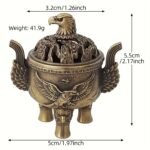 Un majestuoso portaincienso de águila que presenta un tapa con un patrón de nube hueca y un cuerpo adornado con un águila en vuelo en relieve. Este portaincienso de aleación, diseñado con tres patas, simboliza la libertad e independencia, así como la fuerza y el coraje. - Image 8