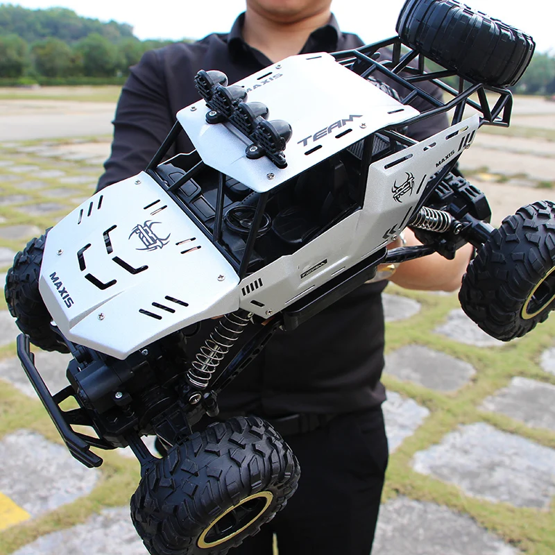 S00ab2aadadf04b8da36d1591792a8510W.webp Coche teledirigido 1:12 / 1:16 4WD con luces Led, coches de Radio Control remoto de 2,4G, Buggy, camiones de Control todoterreno, juguetes para niños - AliExpress 26 - Image 1