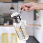 Vaso de vidrio multicapacidad con funda, taza infusora de té de vidrio extragrande portátil para exteriores, vaso para beber con separación de té y agua, taza transparente resistente al calor y al frío para preparar té, botella de agua portátil, jarra para agua fría, vaso de bebida multiusos - Image 14